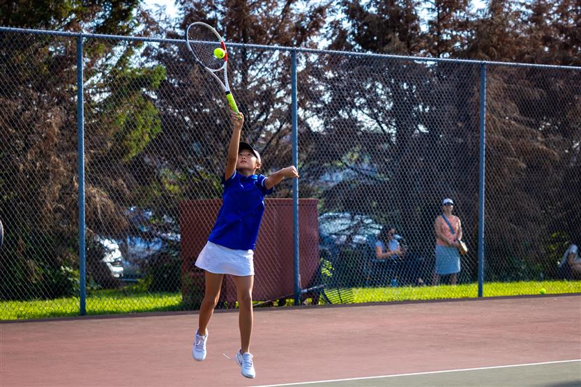 Students play tennis
